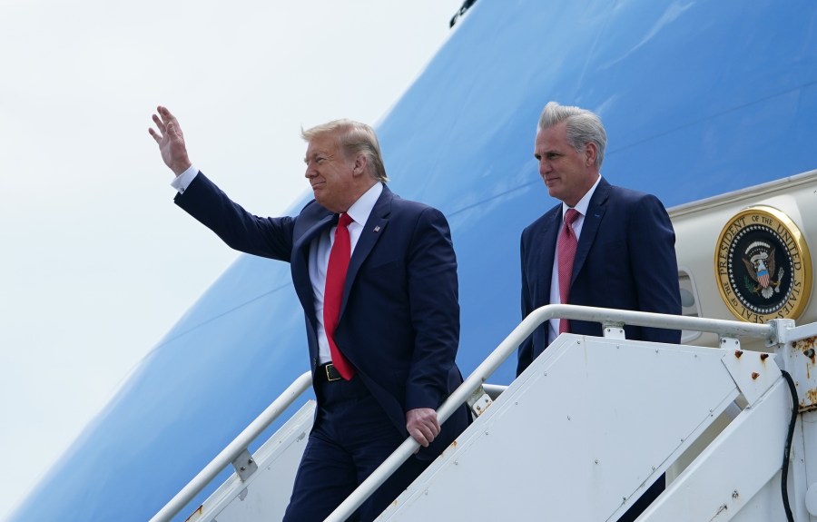 U.S. President Donald Trump waves as he arrives with U.S. Rep. Kevin McCarthy(R-CA), who looks on at Cape Canaveral, Fla., on May 30, 2020.(MANDEL NGAN/AFP via Getty Images)