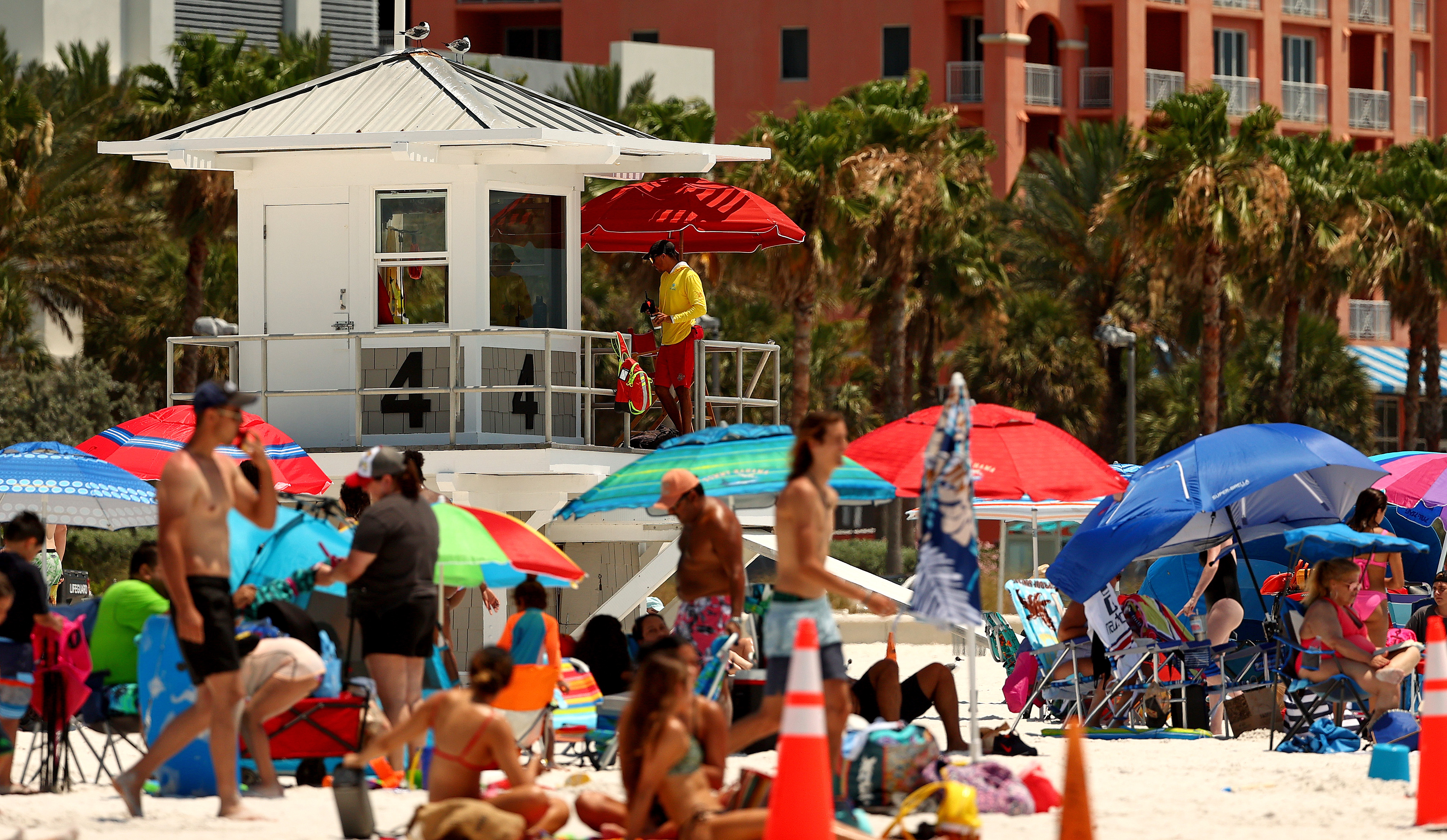 People visit Clearwater Beach on May 20, 2020, in Clearwater, Fla. Florida opened its beaches as part of Phase 1 of its reopening. (Mike Ehrmann/Getty Images)