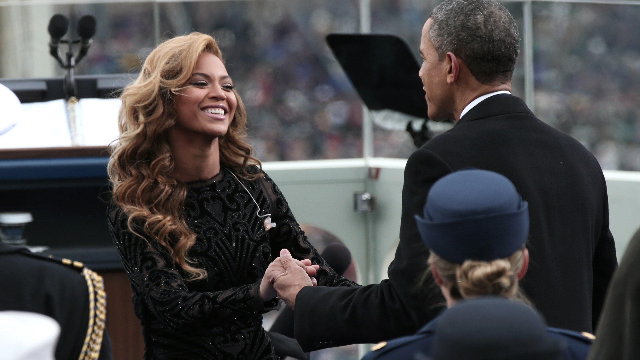 President Barack Obama greets singer Beyonce after she performs the National Anthem during the public ceremonial inauguration on the West Front of the U.S. Capitol Jan. 21, 2013. (Win McNamee/Getty Images)