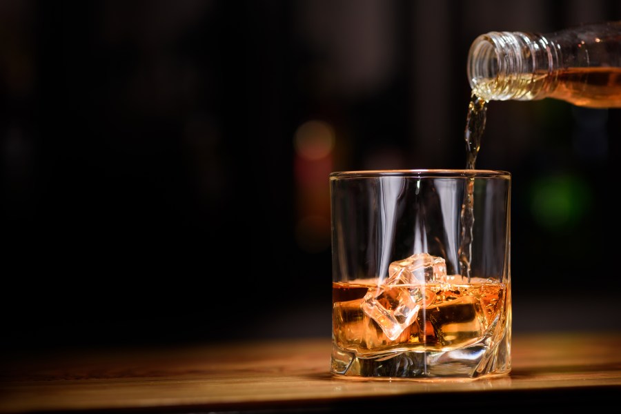 A file photo of an alcoholic beverage being poured into glass. (iStock/Getty Images Plus)