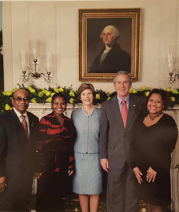 Former White House butler Wilson Roosevelt Jerman with then-President George W. Bush and First Lady Laura Bush. (Shanta Taylor Gay via CNN)