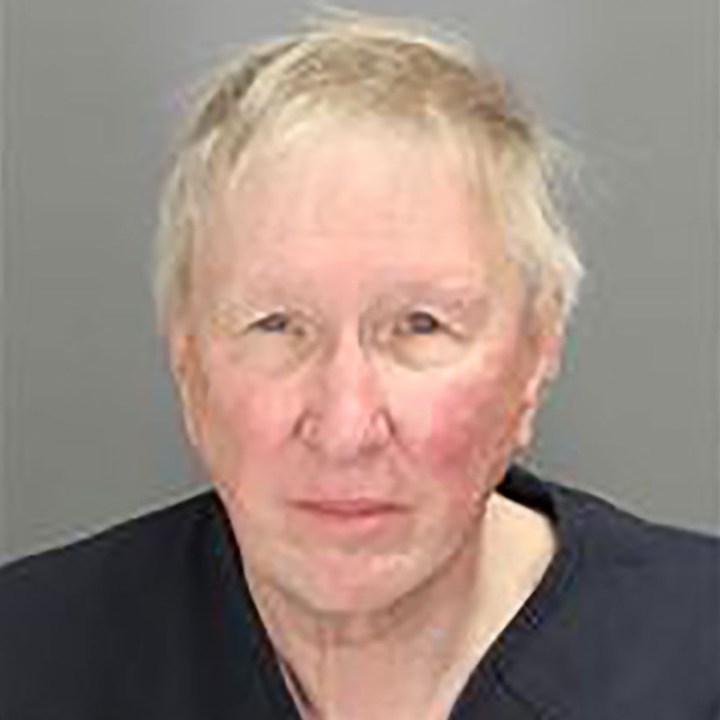 Rex Howard Gomoll is seen in a booking photo released by the Oakland County Sheriff's Office.