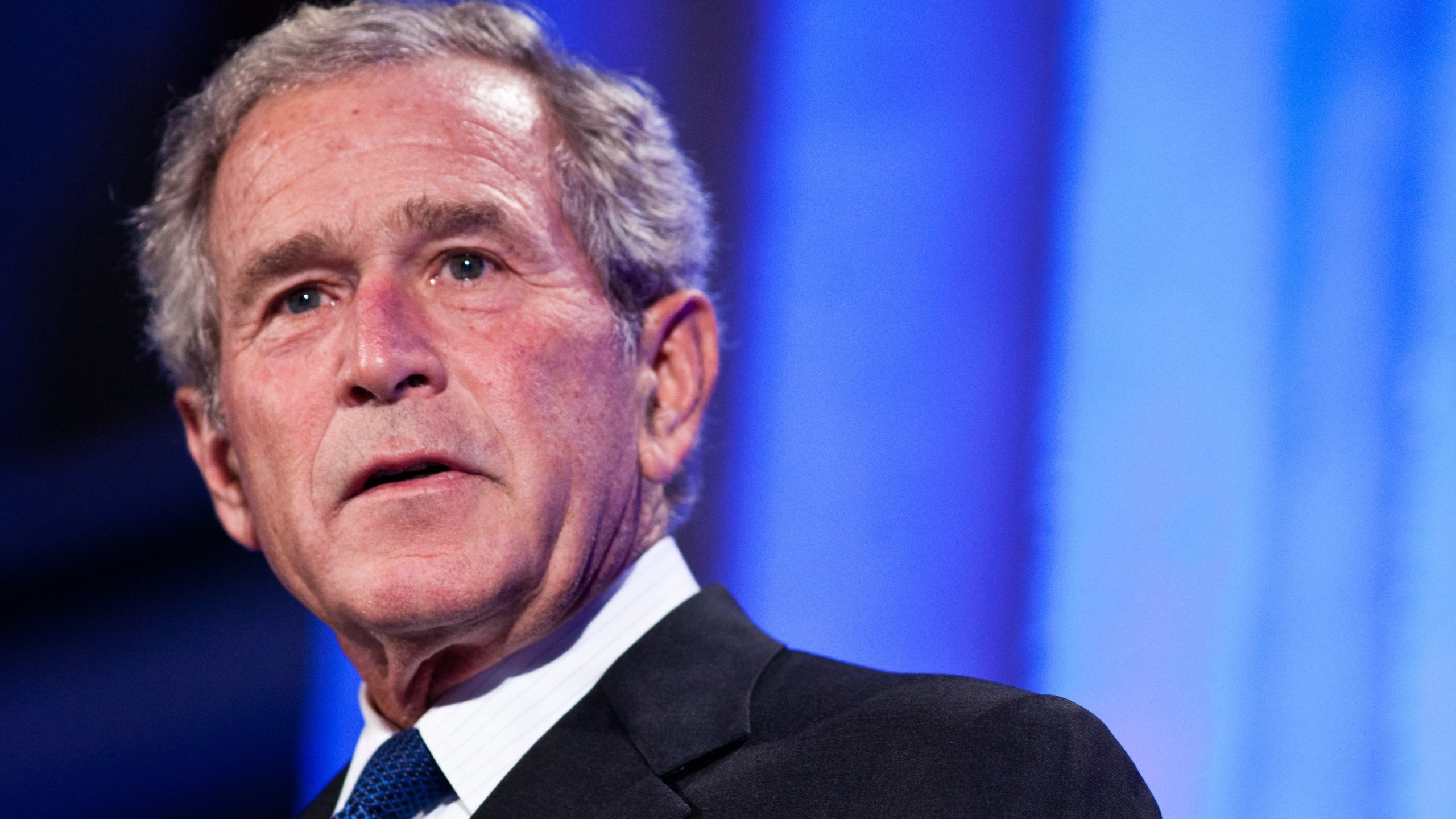 Former President George W. Bush called for an end to partisanship in the nation's continued battle against the coronavirus, urging Americans to "remember that empathy and simple kindness are essential powerful tools of national recovery." ( Brendan Hoffman/Getty Images via CNN)