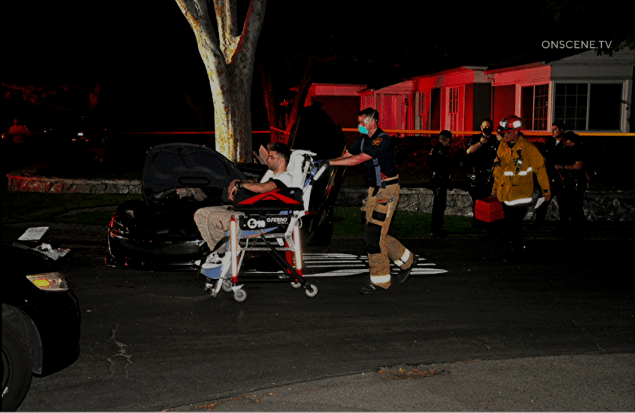 Tattoo artist Daniel Silva is transported from the scene of a suspected DUI crash in Valley Village on May 10, 2020. (OnScene.TV)