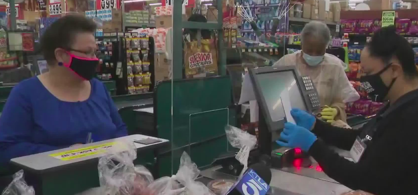 A shopper was surprised with free groceries at the Superior Grocer store in the Vermont-Slauson neighborhood on May 18, 2020. (KTLA)