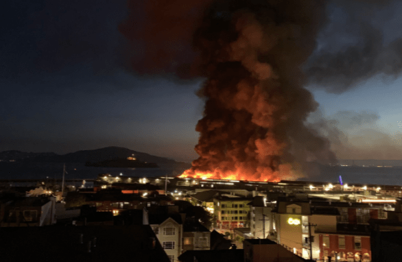 Flames and smoke are seen from Pier 45 in San Francisco on May 23, 2020. (Jack Hutton/Twitter)