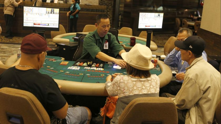 Card players try their luck at the Gardens Casino in Hawaiian Gardens in 2016. (Glenn Koenig / Los Angeles Times)