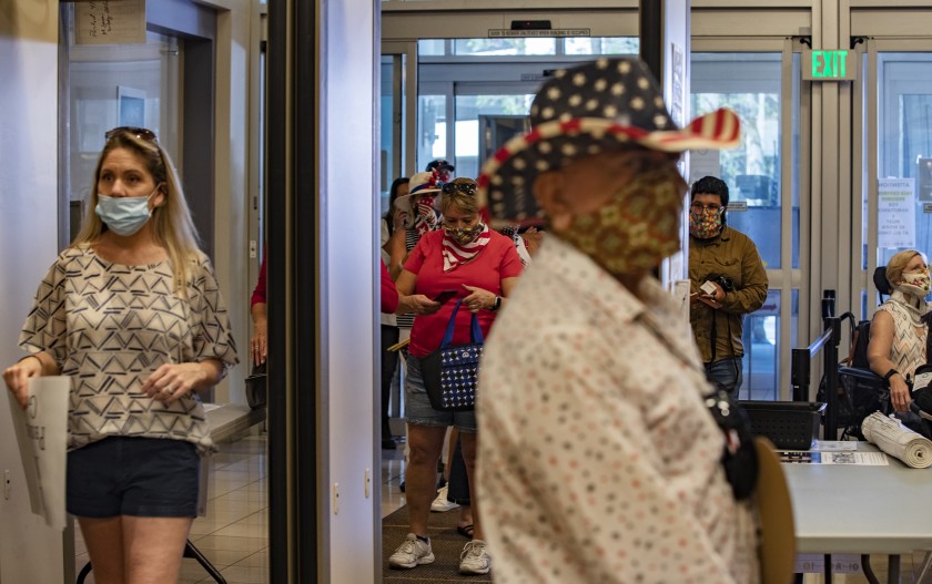 Spectators enter the Riverside County Administrative Center during the Board of Supervisors meeting on May 5, 2020. (Gina Ferazzi / Los Angeles Times)