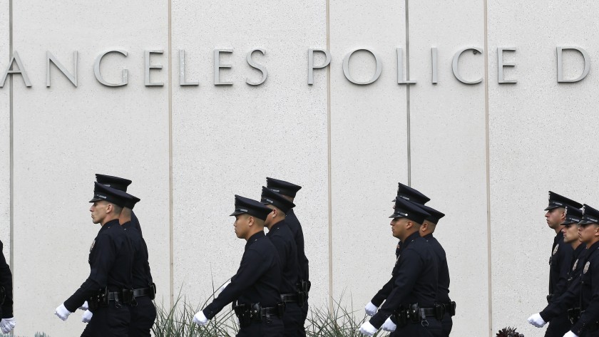 Los Angeles Police Department officers are seen outside the agency’s downtown headquarters in this undated photo. (Brian van der Brug / Los Angeles Times)