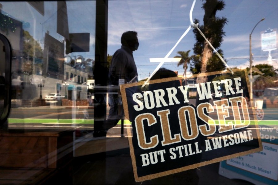 A closed sign in St. Matthew’s Thrift Shop along Main Street in Santa Monica.(Genaro Molina / Los Angeles Times)