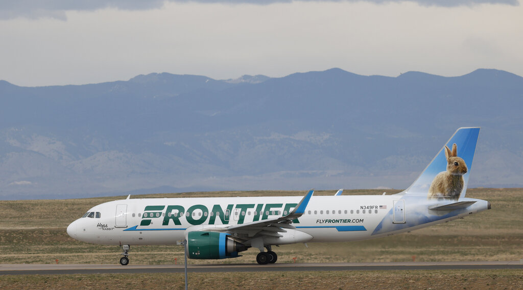 A Frontier Airlines jetl taxis for takeoff from Denver International Airport in Denver. (AP Photo/David Zalubowski)