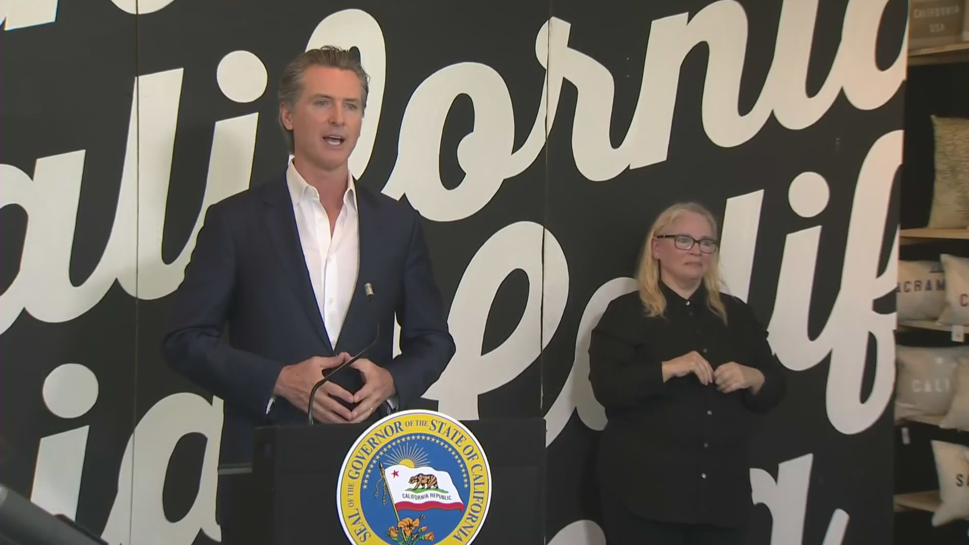 Gov. Gavin Newsom delivers a coronavirus briefing from a small business in Sacramento on May 5, 2020.