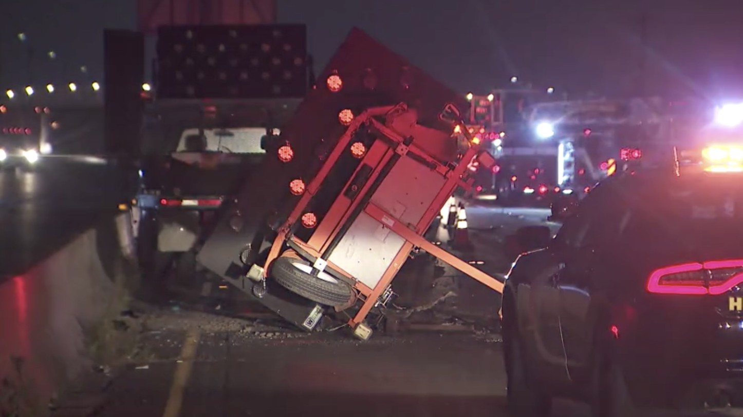 Two Caltrans workers were injured when a car crashed into a sign trailer in Huntington Beach on April 30, 2020. (KTLA)