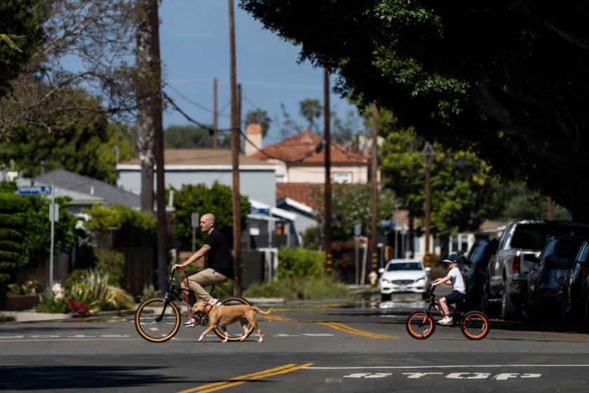 Bicyclists travel through Maxella Avenue in Del Rey on May 2, 2020. (Kent Nishimura / Los Angeles Times)