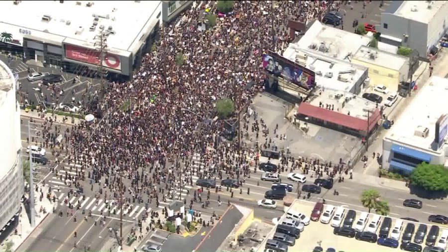 Outside the Beverly Center, protesters march through the streets of central L.A. on May 30, 2020, as part of nationwide demonstrations after the killing of George Floyd in Minneapolis. (KTLA)