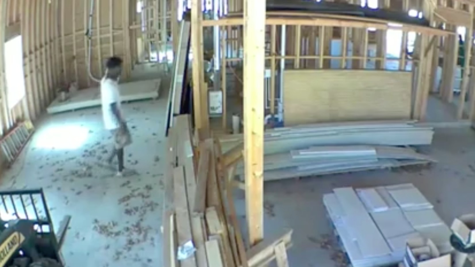 Surveillance video from a construction site appears to show Ahmaud Arbery shortly before he was shot and killed while running in a south Georgia neighborhood in February. (CNN)