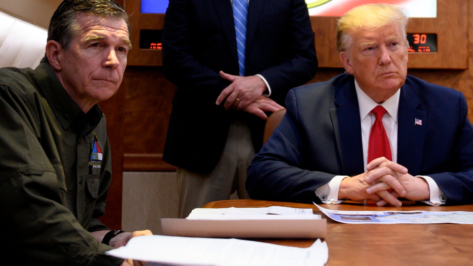 US President Donald Trump holds a meeting aboard Air Force One on Huricane Dorian with North Carolina Governor Roy Cooper on September 9, 2019. (JIM WATSON/AFP via Getty Images)