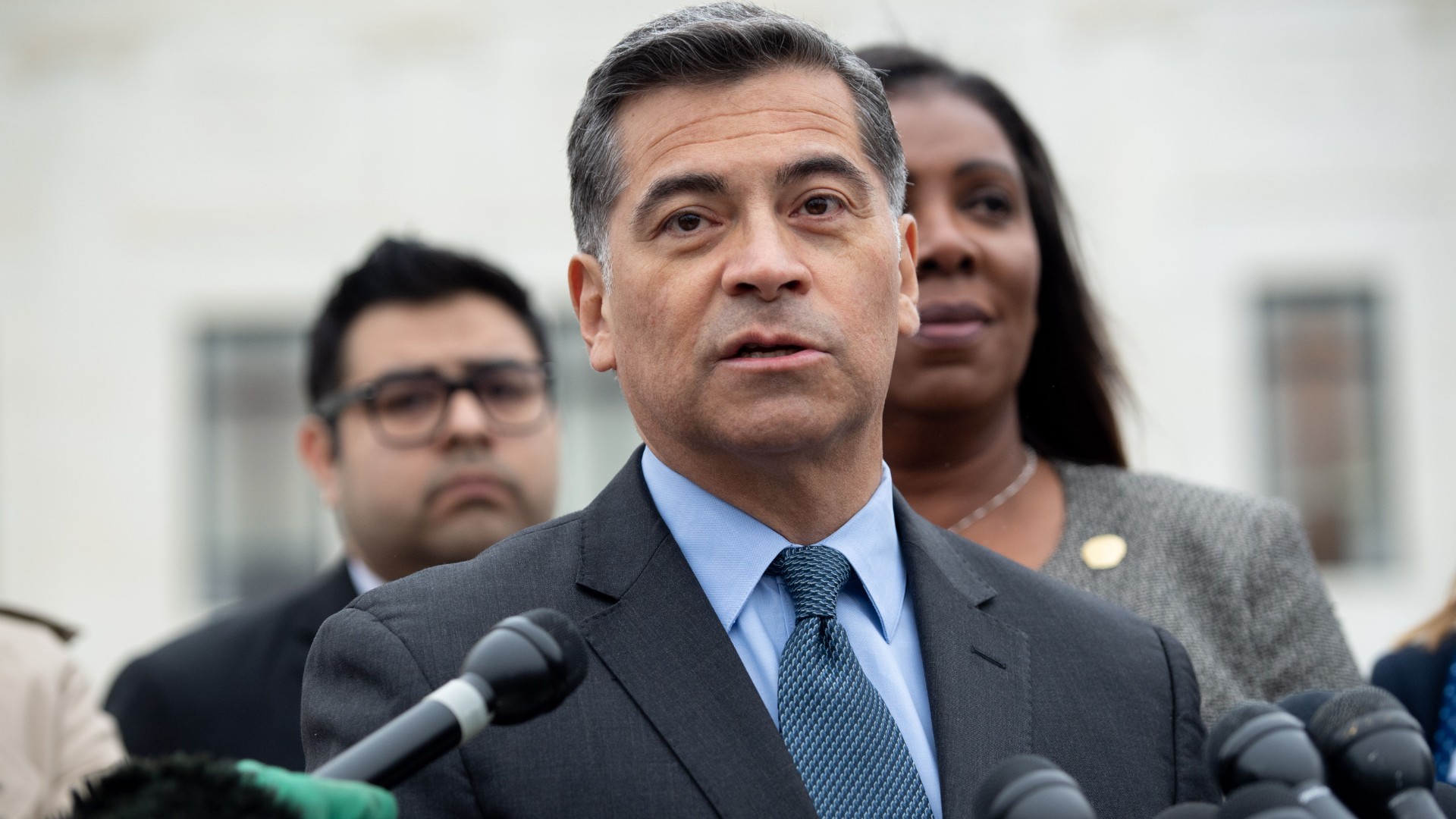 California Attorney General Xavier Becerra speaks following arguments about ending the Deferred Action for Childhood Arrivals program outside the U.S. Supreme Court on Nov. 12, 2019. (Saul Loeb / AFP / Getty Images)