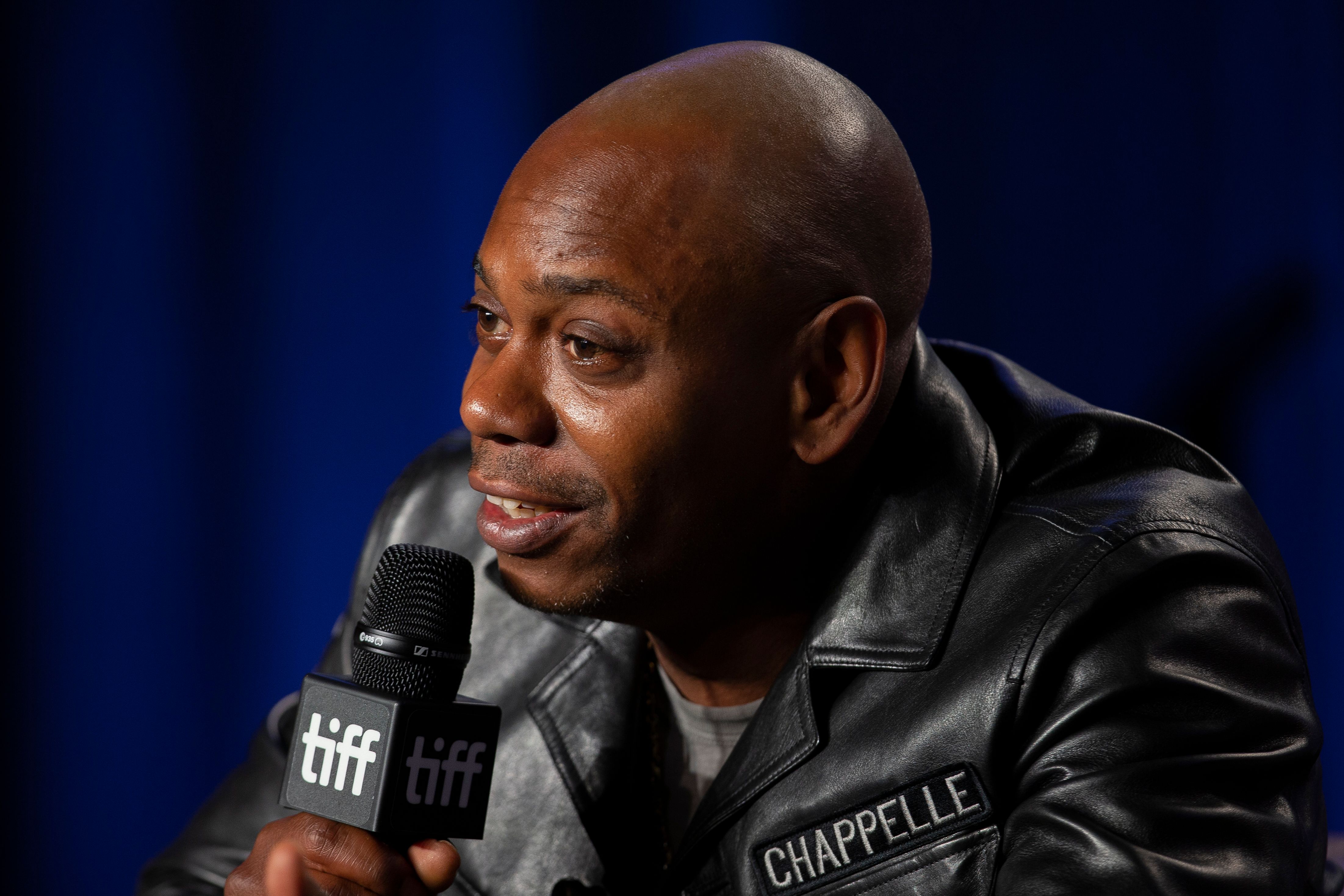 Dave Chappelle speaks during the 'A Star is Born' press conference at the Toronto International Film Festival in Toronto, Ontario, Sept. 9, 2018. (GEOFF ROBINS/AFP via Getty Images)