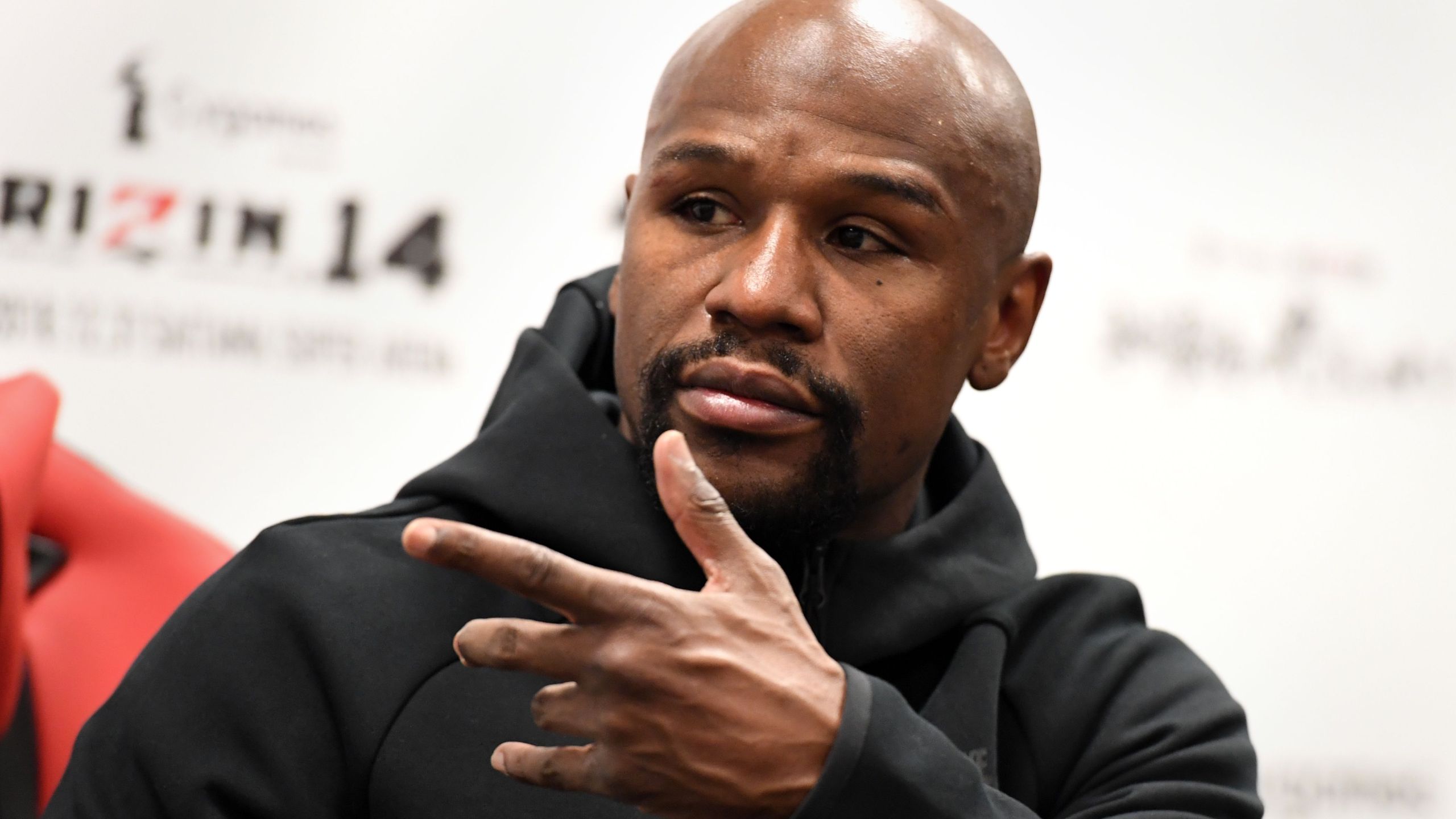 U.S. boxing legend Floyd Mayweather Jr gestures during a press conference