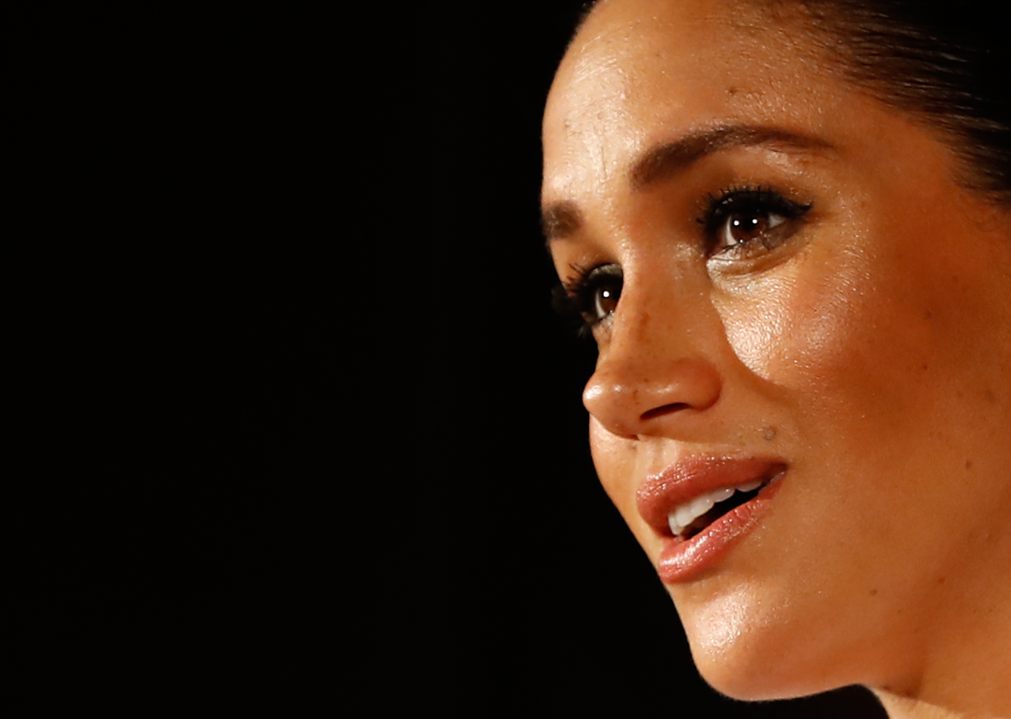 Meghan Markle, Duchess of Sussex, presents the Celebrating Excellence Award in London on Feb. 7, 2019. (TOLGA AKMEN/AFP via Getty Images)