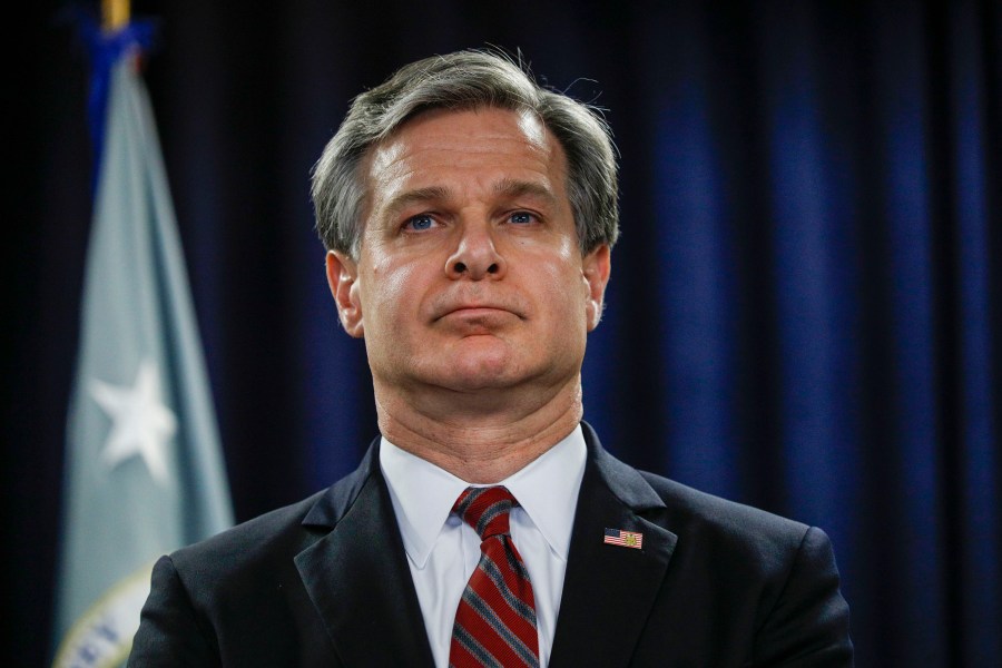 FBI Director Christopher Wray waits to speak at a news conference in Detroit on Dec. 18, 2019. (Bill Pugliano/Getty Images)