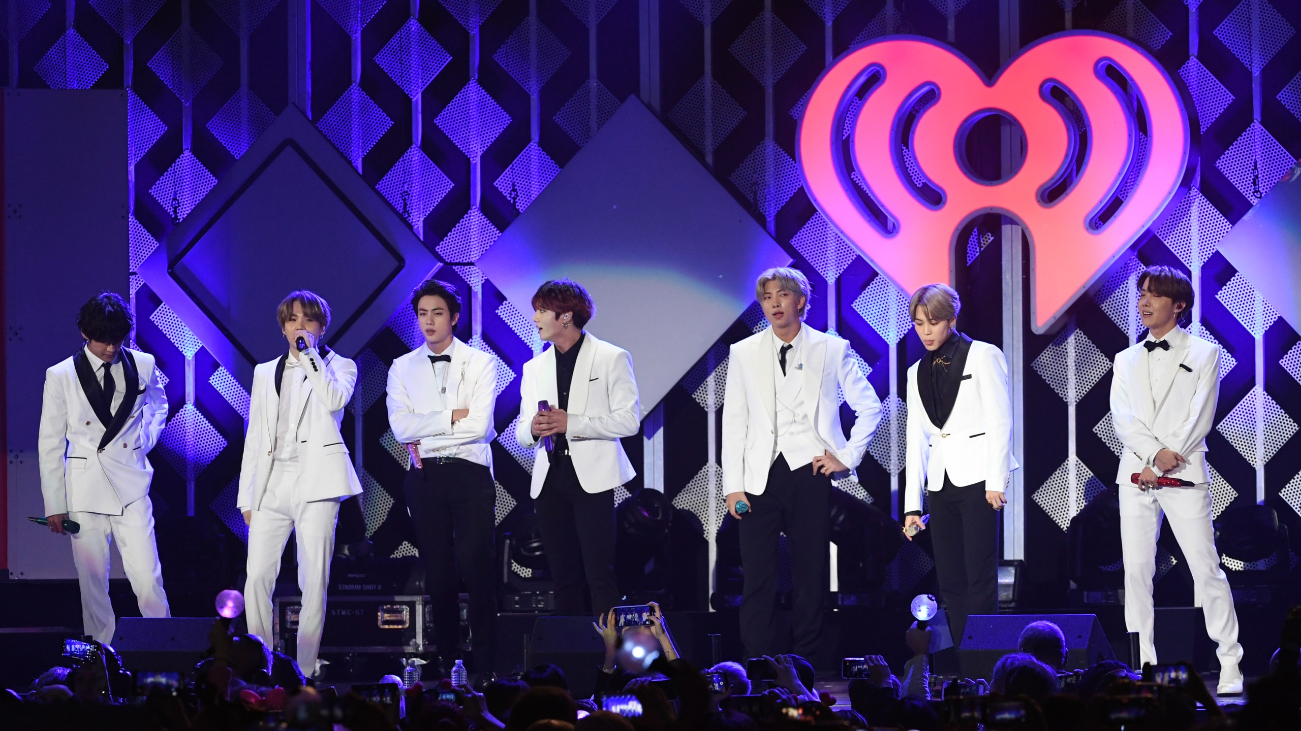 From left: V, Suga, Jin, Jungkook, RM, Jimin, and J-Hope of BTS perform onstage during 102.7 KIIS FM's Jingle Ball 2019 at the Forum on Dec. 6, 2019. (Kevin Winter/Getty Images for iHeartMedia)