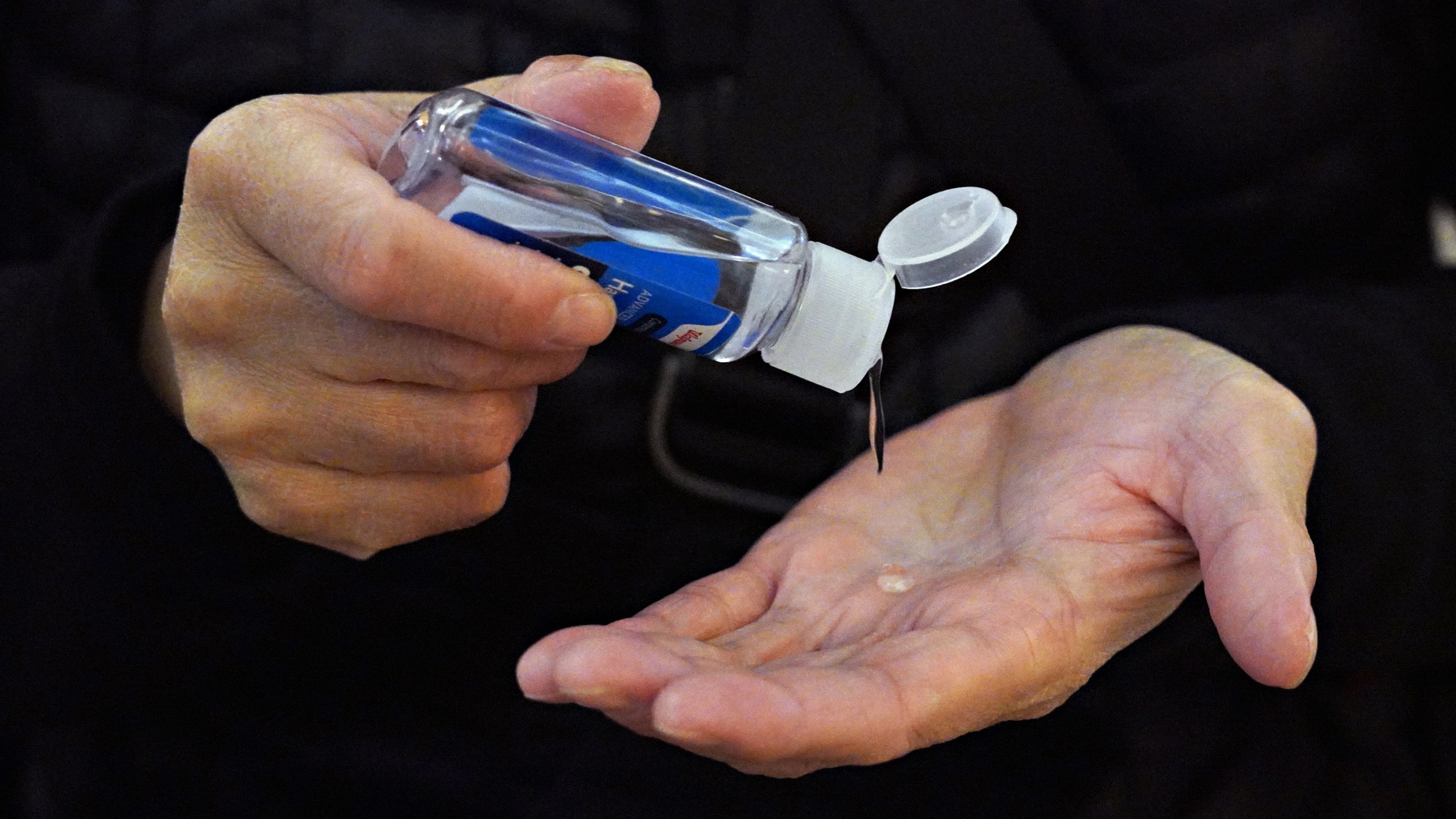 A commuter at Grand Central uses hand sanitizer as the coronavirus continues to spread across the United States on March 16, 2020, in New York City. (Cindy Ord/Getty Images)