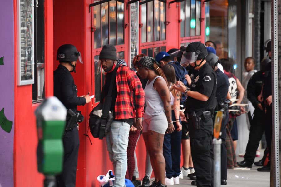 People are arrested in Hollywood on June 1, 2020, as a third night of curfews followed days of massive, mostly peaceful protests to decry George Floyd's death in Minneapolis. (Robyn Beck / AFP via Getty Images)