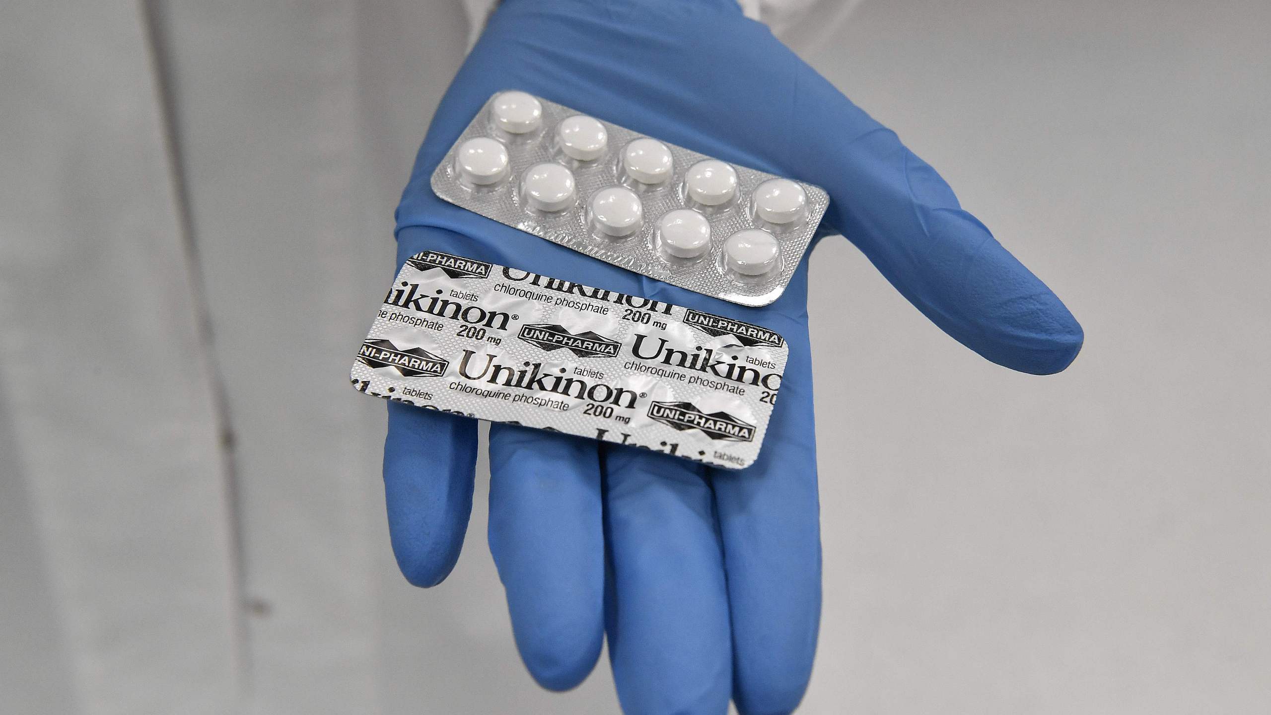 Unikinon chloroquine pills are seen in packaging at the Uni-pharma pharmaceutical company in a northern suburb of Athens, Greece on June 5, 2020, where chloroquine pills are produced. (LOUISA GOULIAMAKI/AFP via Getty Images)