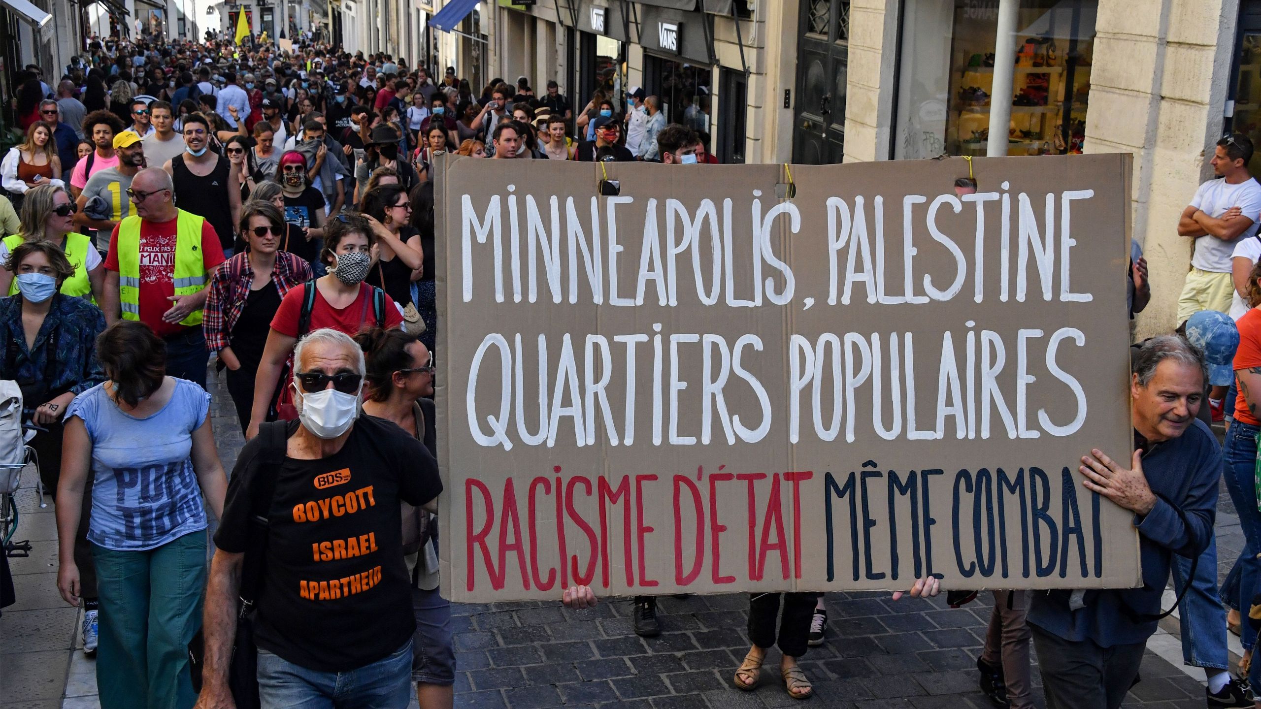 Protestors march with placards during a demonstration on June 13, 2020, in Montpellier, in the south of France, as part of the 'Black Lives Matter' worldwide protests against racism and police brutality. (PASCAL GUYOT/AFP via Getty Images)