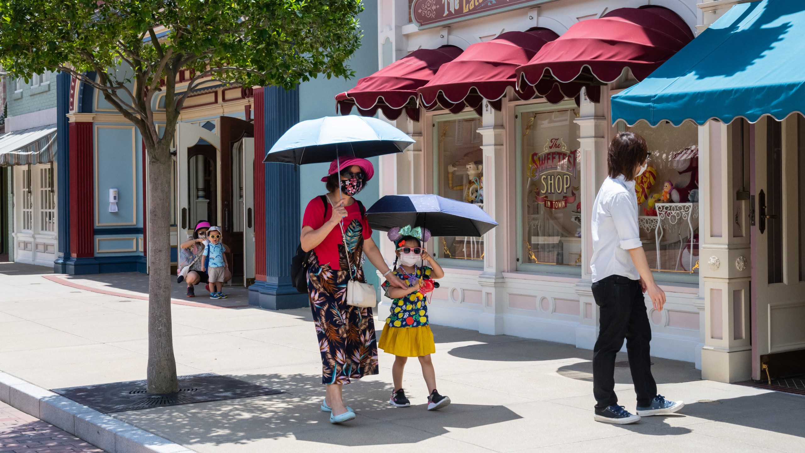 Visitors walk in Walt Disney Co.'s Disneyland Resort on June 18, 2020 ,in Hong Kong, China. (Billy H.C. Kwok/Getty Images)