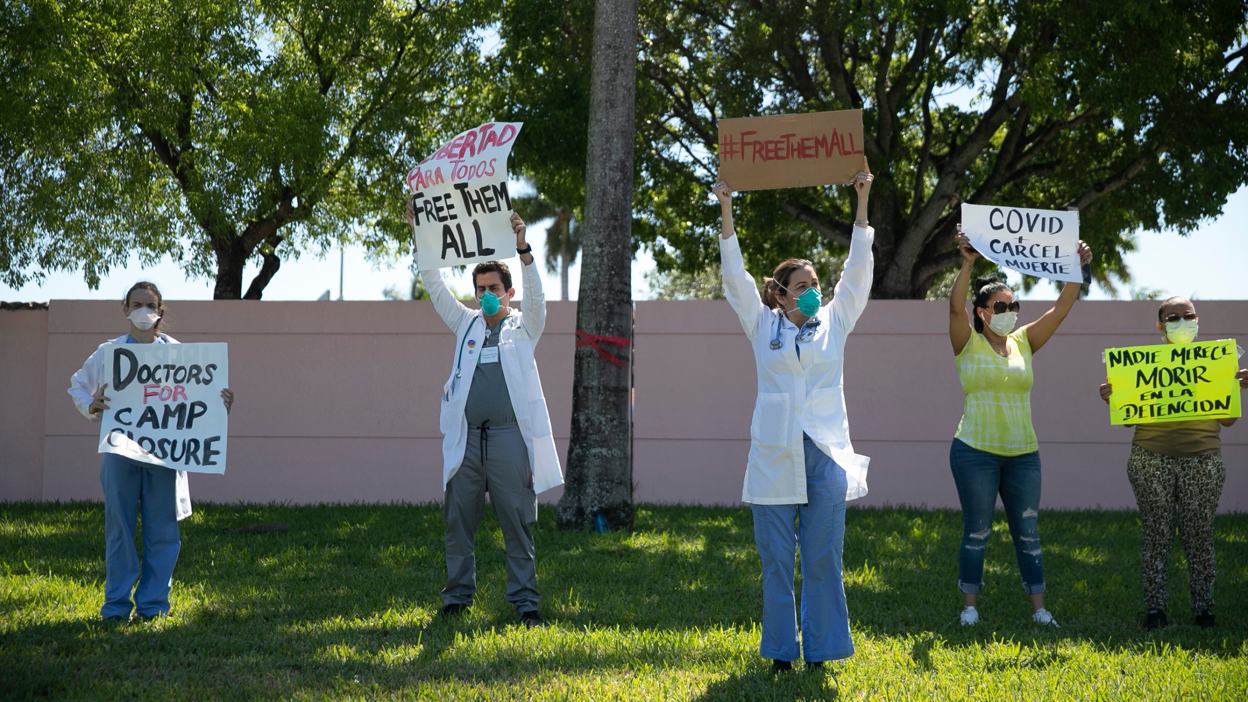 Protesters stand outside of the Immigration and Customs Enforcement's Broward Transitional Center on May 1, 2020 in Pompano Beach, Florida. (Joe Raedle/Getty Images)