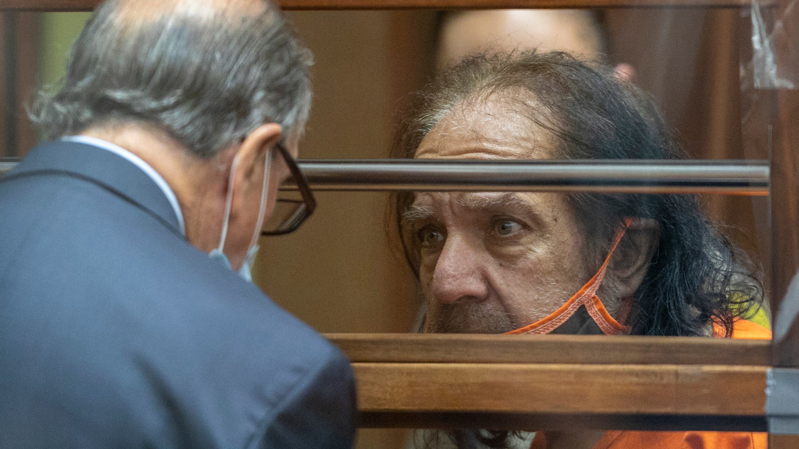 Adult film actor Ron Jeremy talks with his attorney Stuart Goldfarb during his arraignment on rape and sexual assault charges at Clara Shortridge Foltz Criminal Justice Center in downtown Los Angeles on June 26, 2020. (David McNew / AFP / Getty Images)