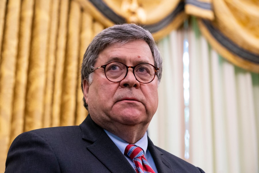 Attorney General William Barr listens as U.S. President Donald Trump speaks in the Oval Office on May 28, 2020. (Doug Mills-Pool/Getty Images)