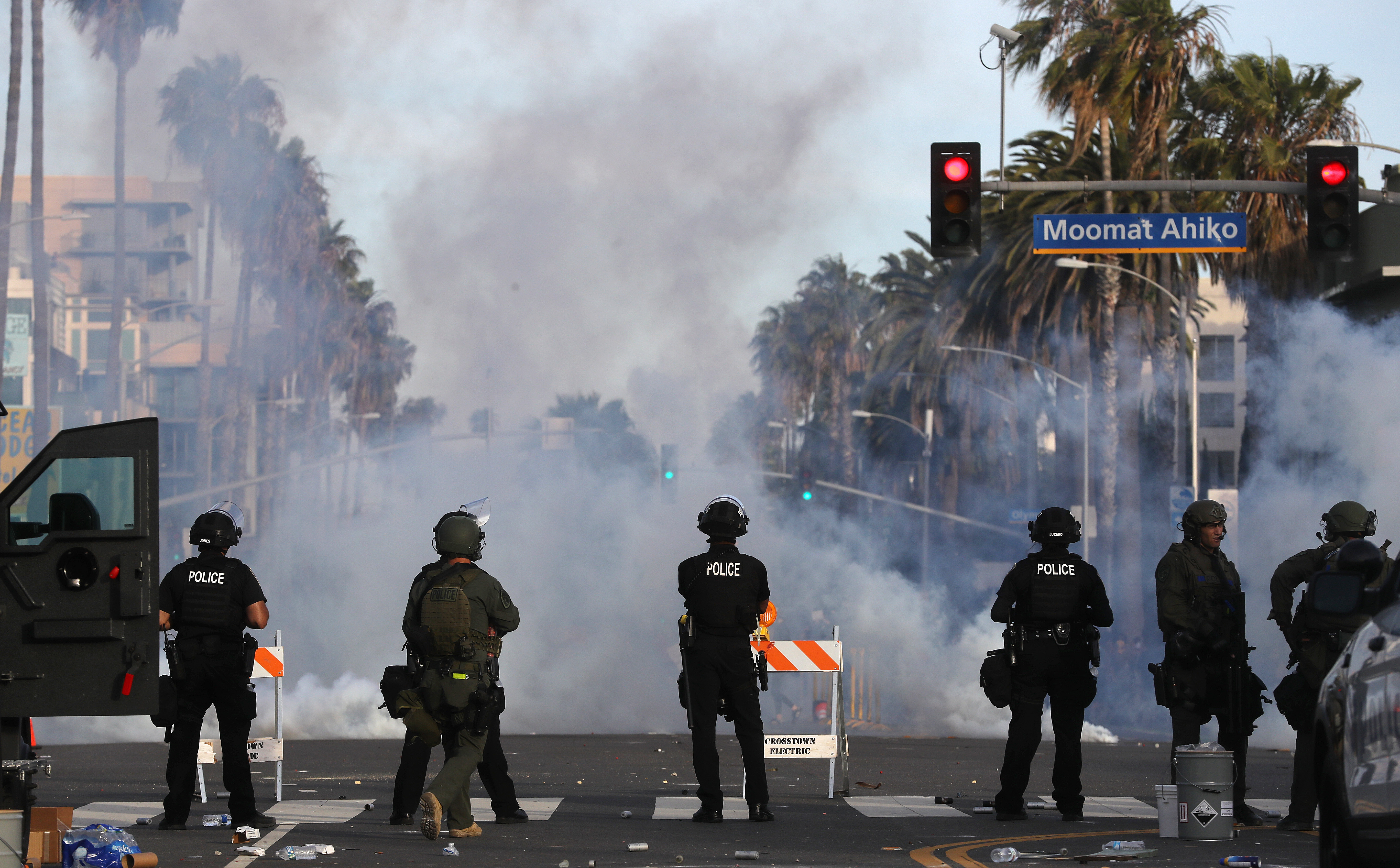 Police watch as tear gas is deployed during demonstrations in Santa Monica following the death of George Floyd on May 31, 2020.(Mario Tama/Getty Images)