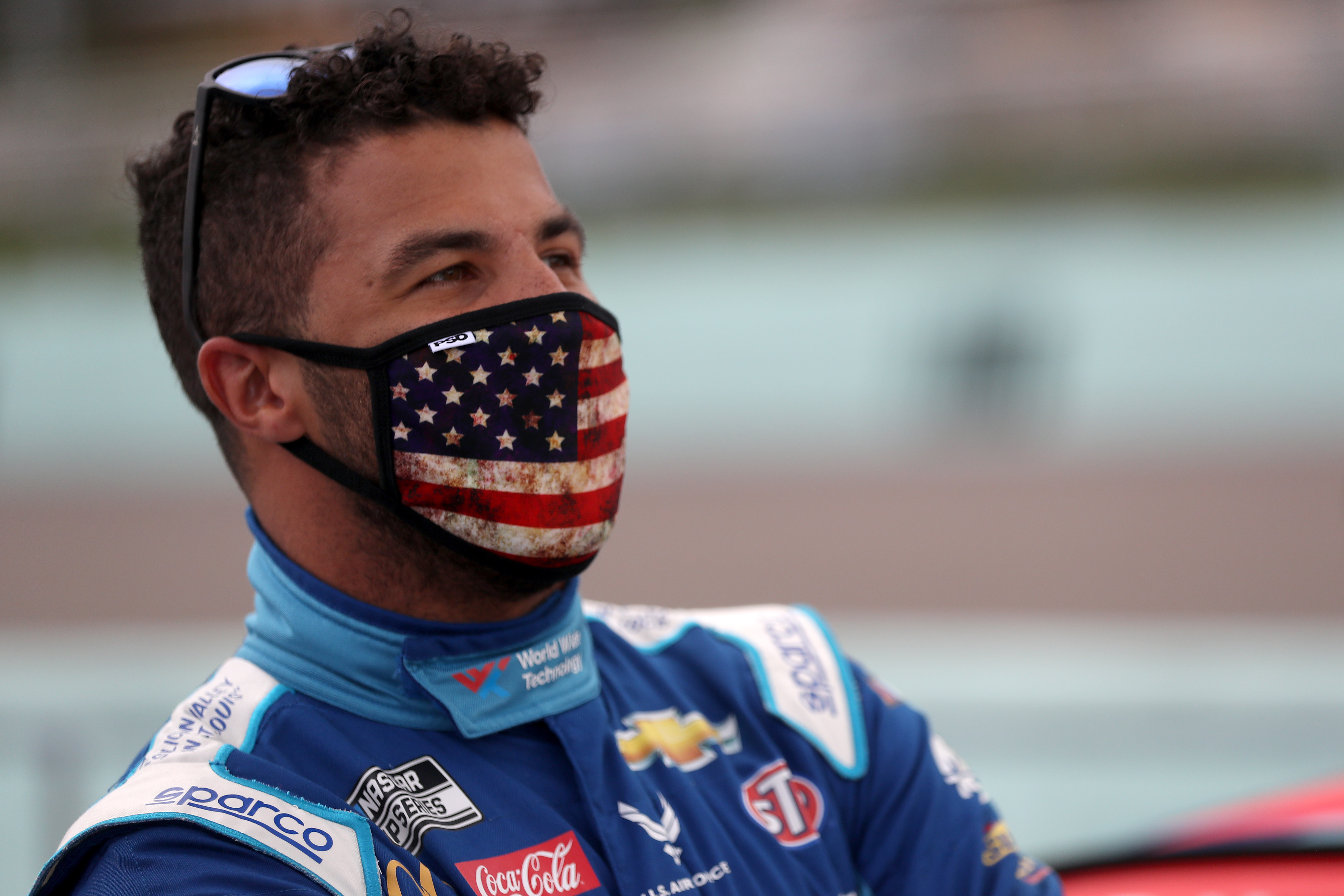 Bubba Wallace, driver of the #43 World Wide Technology Chevrolet, stands on the grid prior to the NASCAR Cup Series Dixie Vodka 400 at Homestead-Miami Speedway on June 14, 2020 ,in Homestead, Florida. (Chris Graythen/Getty Images)