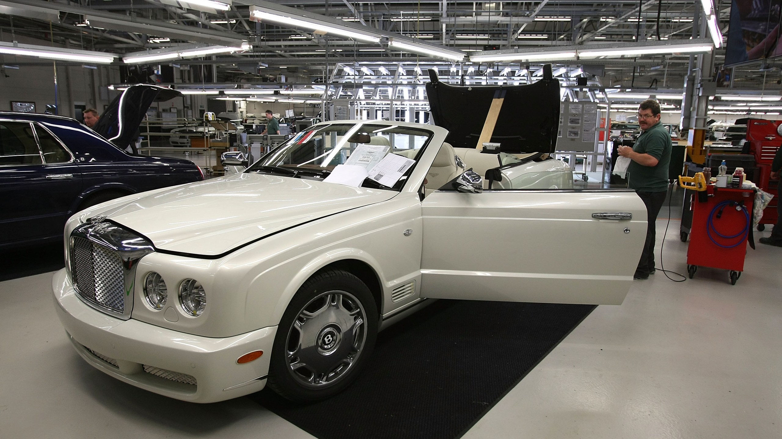 A Bentley undergoes final preparation and inspection in the Mulliner workshop at the Bentley Motors Factory on 19 November, 2007, in Crewe, England. (Christopher Furlong/Getty Images)