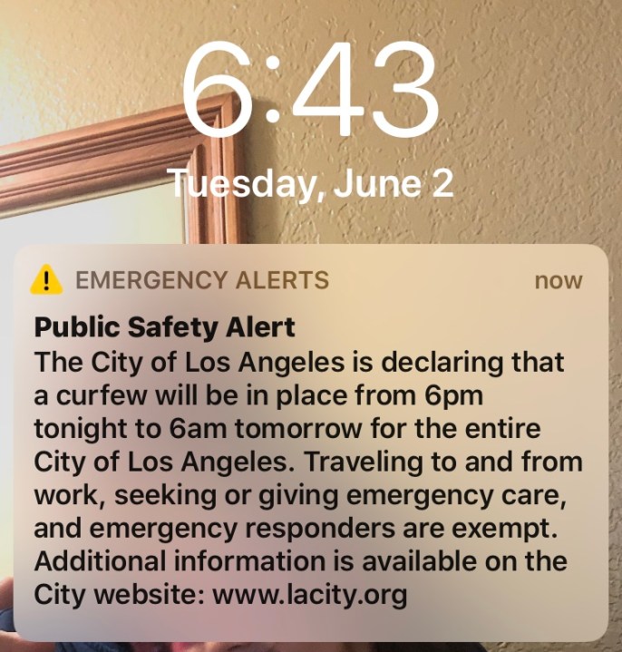 The city of L.A. issues an emergency alert the evening of June 2, 2020, indicating a curfew will go into effect for a fifth night amid widespread civil unrest. (KTLA)