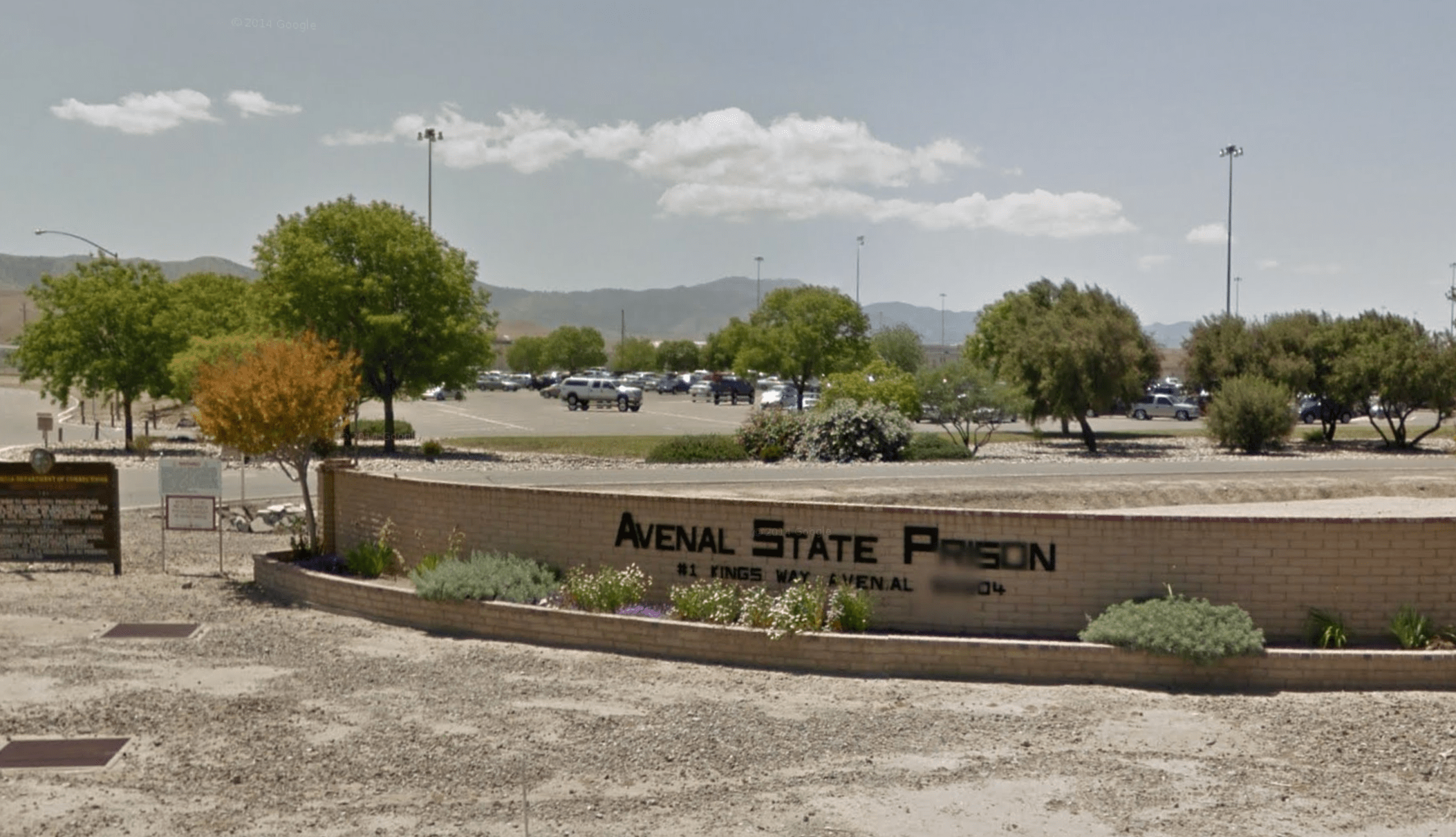 A sign for Avenal State Prison in Kings County is seen in a Google Maps Street View image.