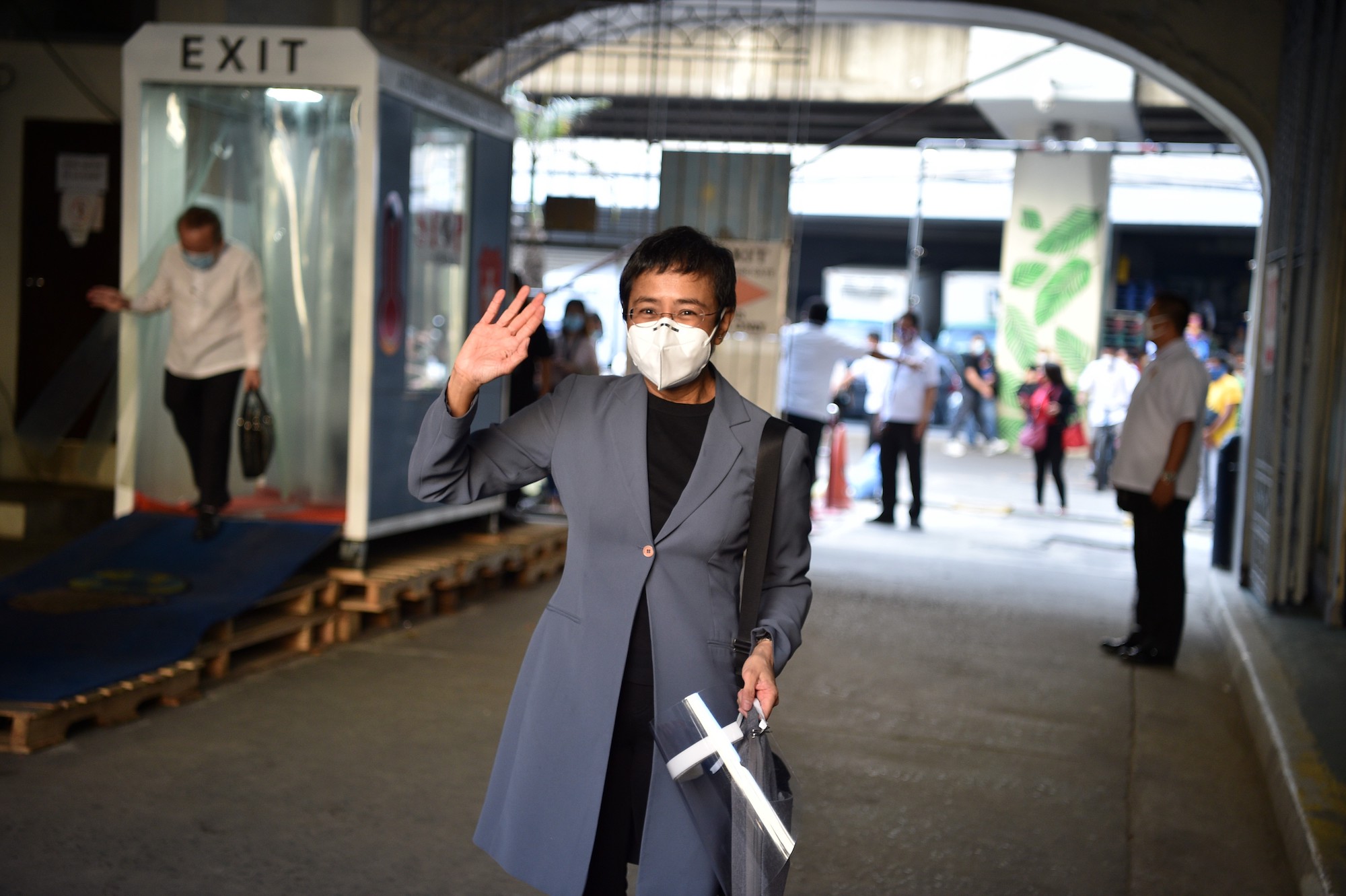 Philippine journalist Maria Ressa arrives for her court verdict at the court building in Manila on June 15, 2020. (TED ALJIBE/AFP via Getty Images)