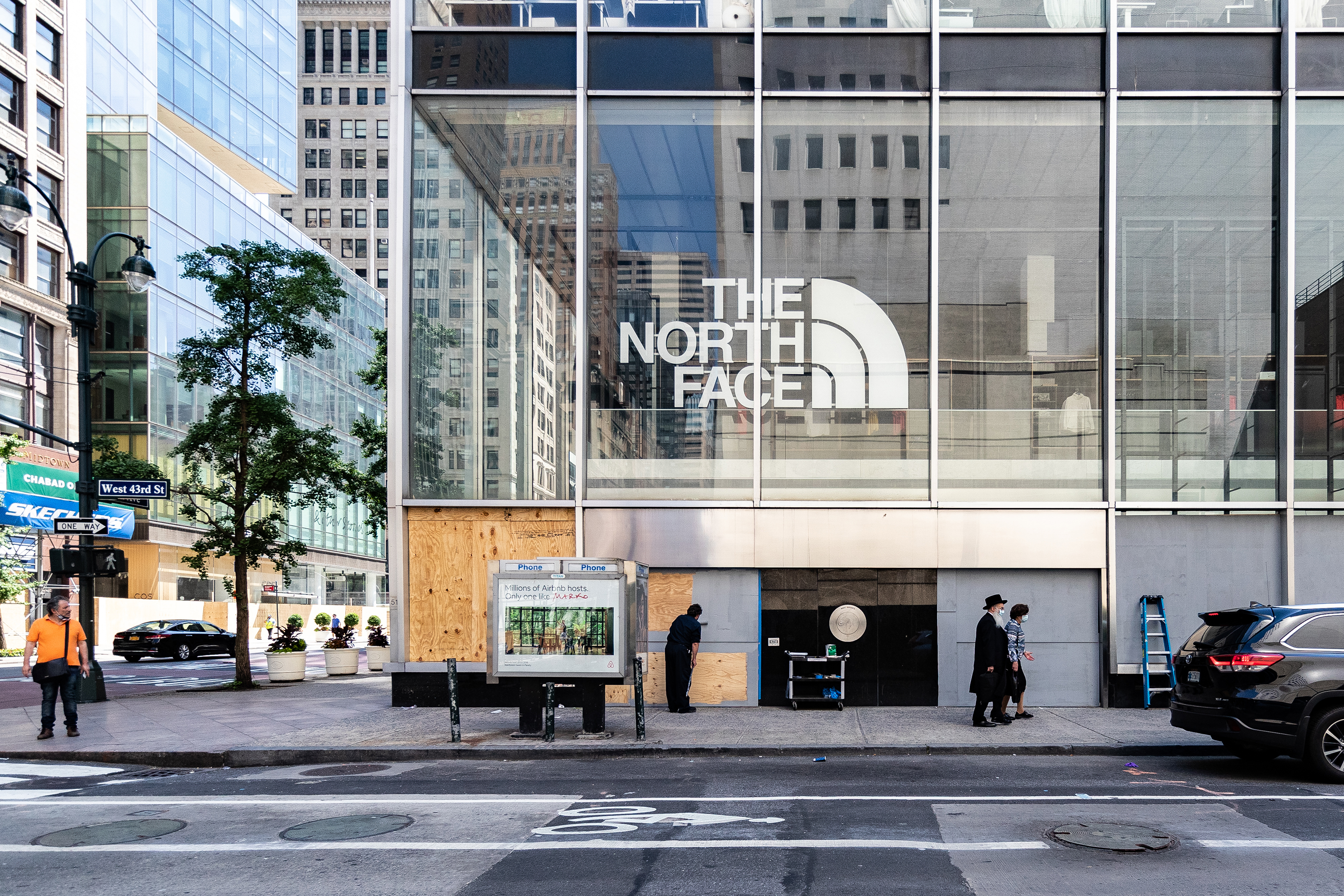 A boarded up North Face Inc. store stands in New York, U.S., on Tuesday, June 9, 2020. New York City, which experienced the biggest and deadliest Covid-19 outbreak in the country, began reopening on June 8. (Jeenah Moon/Bloomberg via Getty Images)