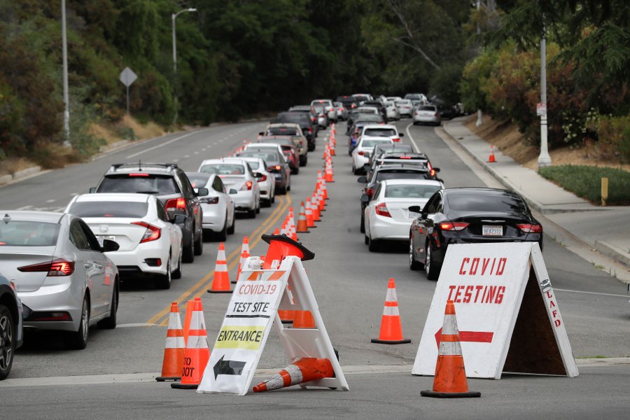 Motorists line up at a coronavirus testing site at Dodger Stadium Monday, June 29, 2020, in Los Angeles. (Marcio Jose Sanchez/AP via CNN Wire)