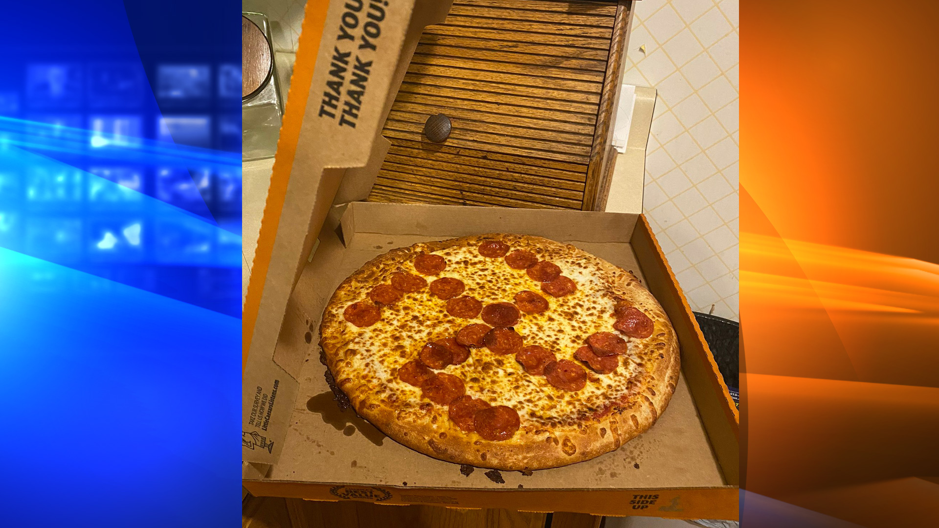 Jason Laska says he grabbed a "hot and ready pizza" from the warmer at Little Caesars in Brook Park, Ohio, that had a swastika made out of pepperonis. (Jason and Misty Laska)