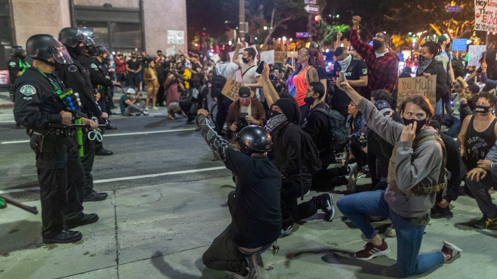 Protesters confront police as demonstrations continue over the killing of George Floyd on June 6, 2020 in Los Angeles, California. (David McNew/Getty Images)