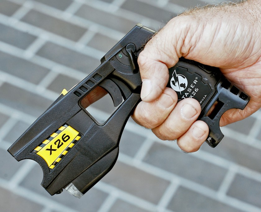 Amid a debate on police use of force, San Mateo County voted to purchase 310 new Tasers in June 2020, replacing some older ones, like the one above, seen in 2007. (Los Angeles Times)