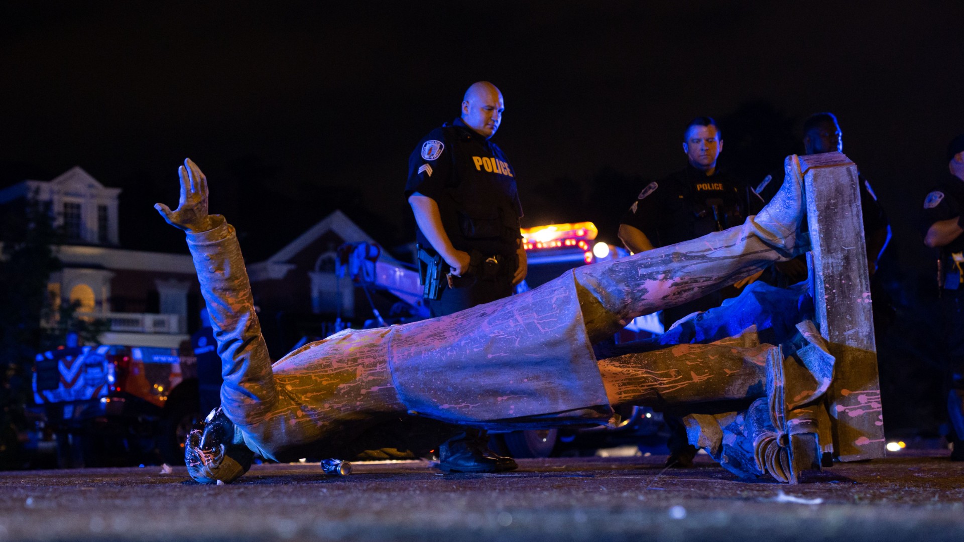 A statue of Confederate States President Jefferson Davis lies on the street after protesters pulled it down in Richmond, Virginia, on June 10, 2020. (PARKER MICHELS-BOYCE/AFP via Getty Images)