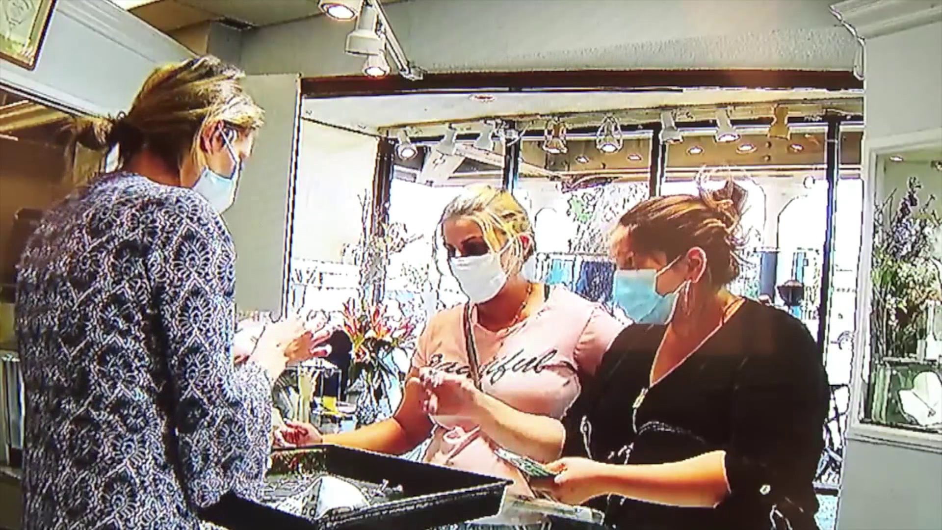 Two women were seen in security footage at Designs by Steven jewelry store in Villa Park.