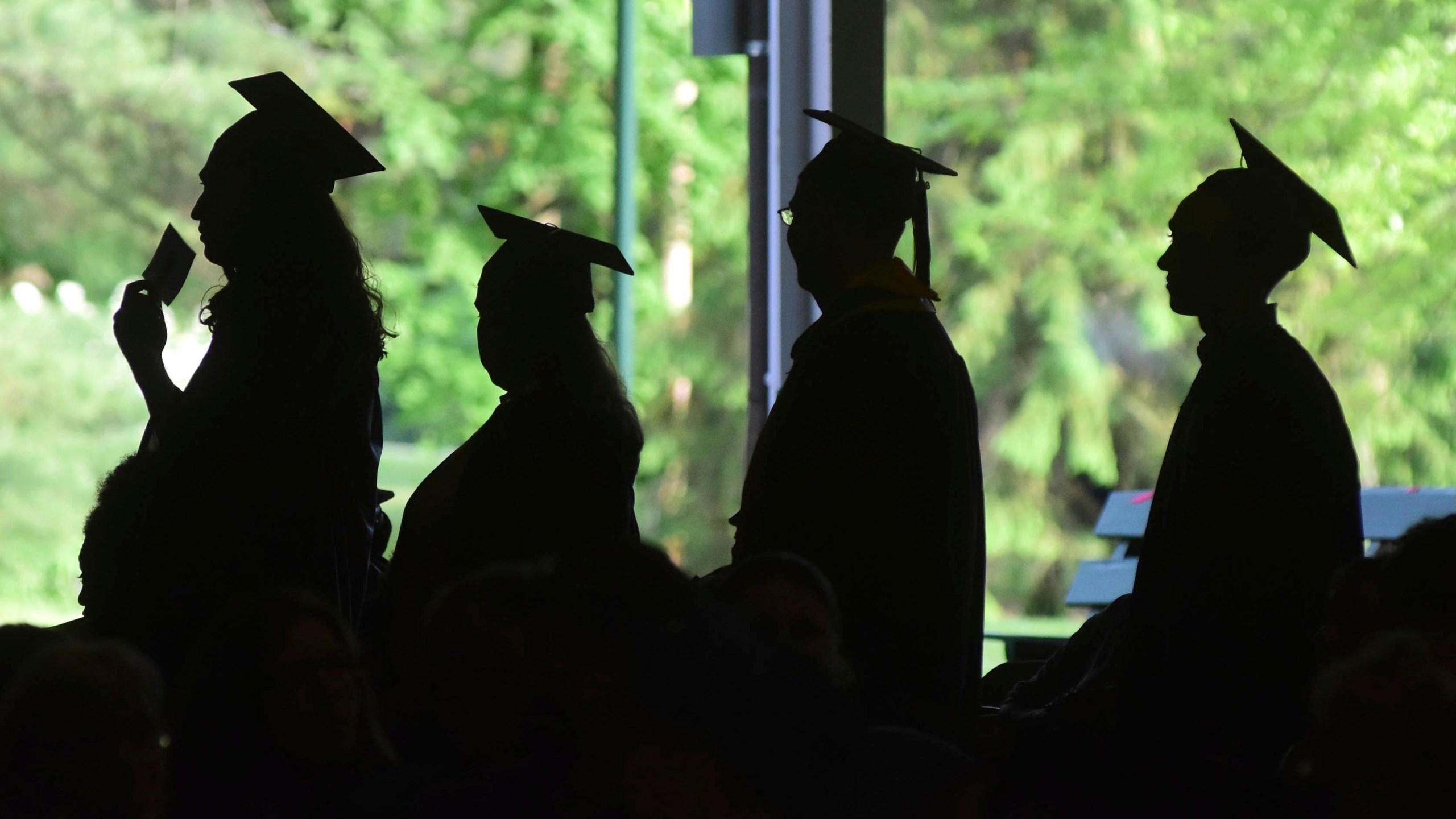 Graduates are seen in an undated photo. (Gillian Jones/The Berkshire Eagle via AP, File)