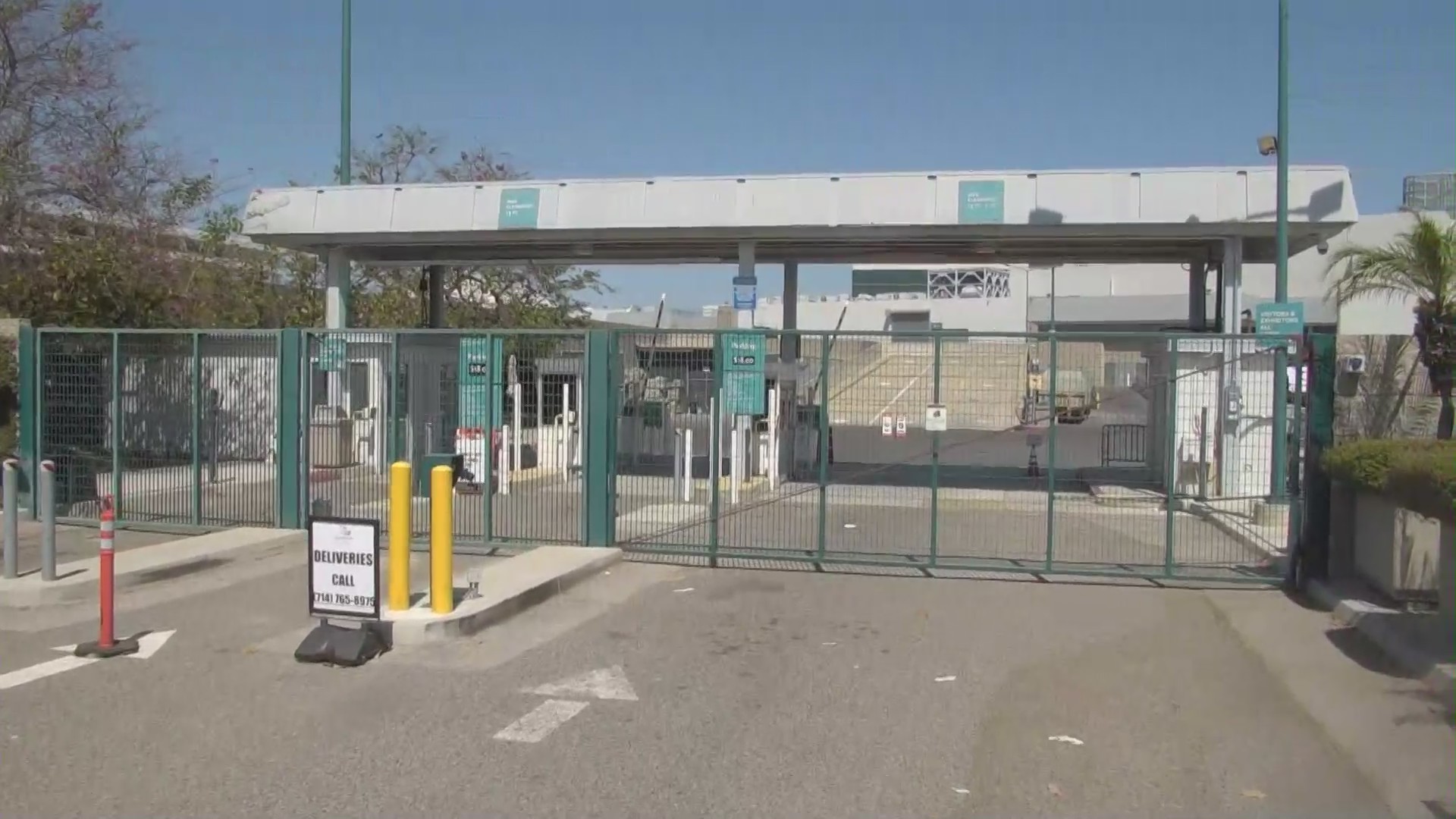 The gates to the Anaheim Convention Center are seen on July 14, 2020, a day before a coronavirus testing site was set to open there. (KTLA)